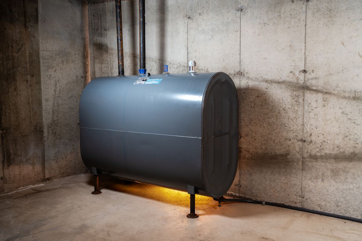 Heating oil tank in a basement with a Smart Oil Gauge installed